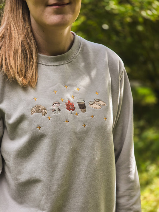 Cosy Autumn Essentials embroidered sweatshirt with croissant, coffee, mushroom and leaf and slipper design
