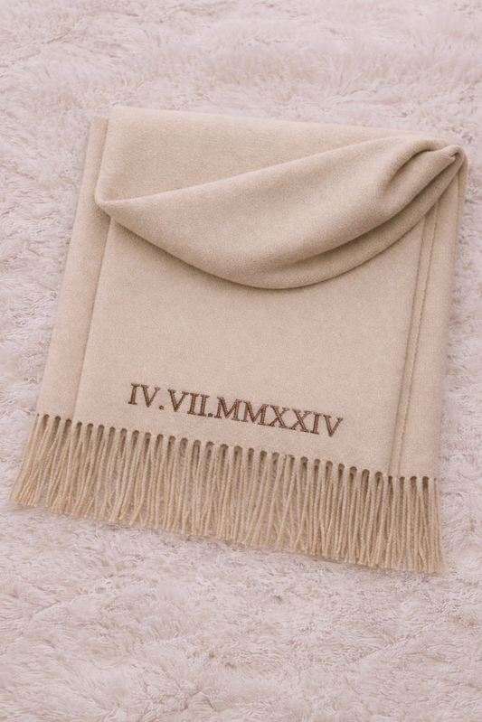 Cream personalised scarf with embroidered Roman numeral date and tassel edge