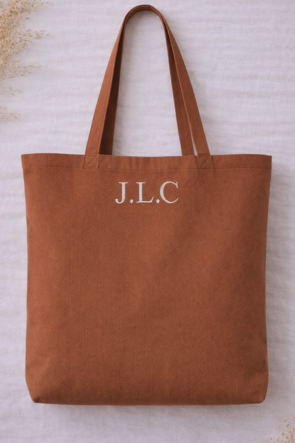 Personalised embroidered monogram tote bag in 100% organic cotton featuring custom initial embroidery